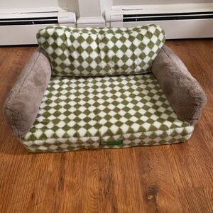 Cat couch bed with removable cover.